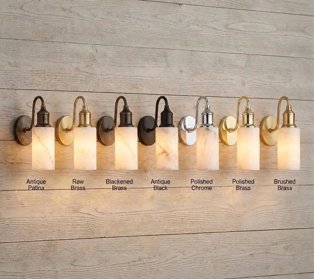 Gooseneck alabaster cylinder wall sconce shown across seven finish options on a wood-plank wall