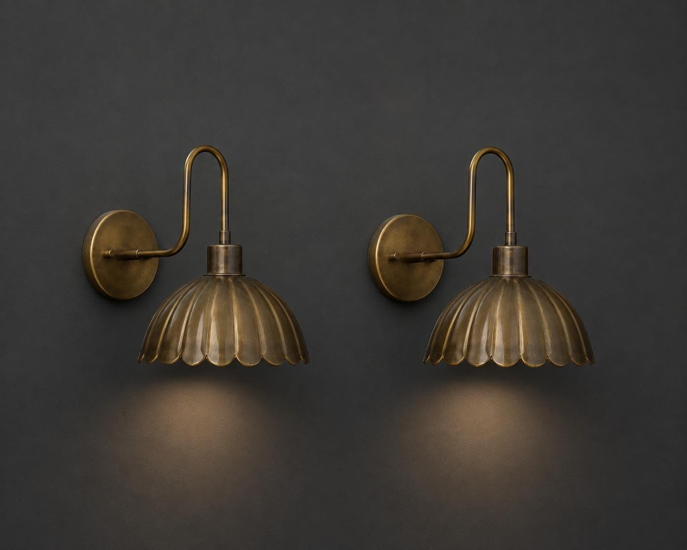 Antique brass wall sconce with scalloped shade — image 1 of 10